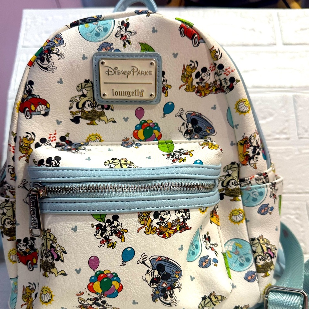 Loungefly /Disney parks runaway railroad